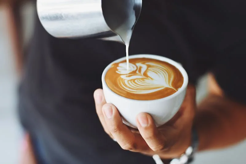 A perfectly crafted flat white coffee in a ceramic cup
